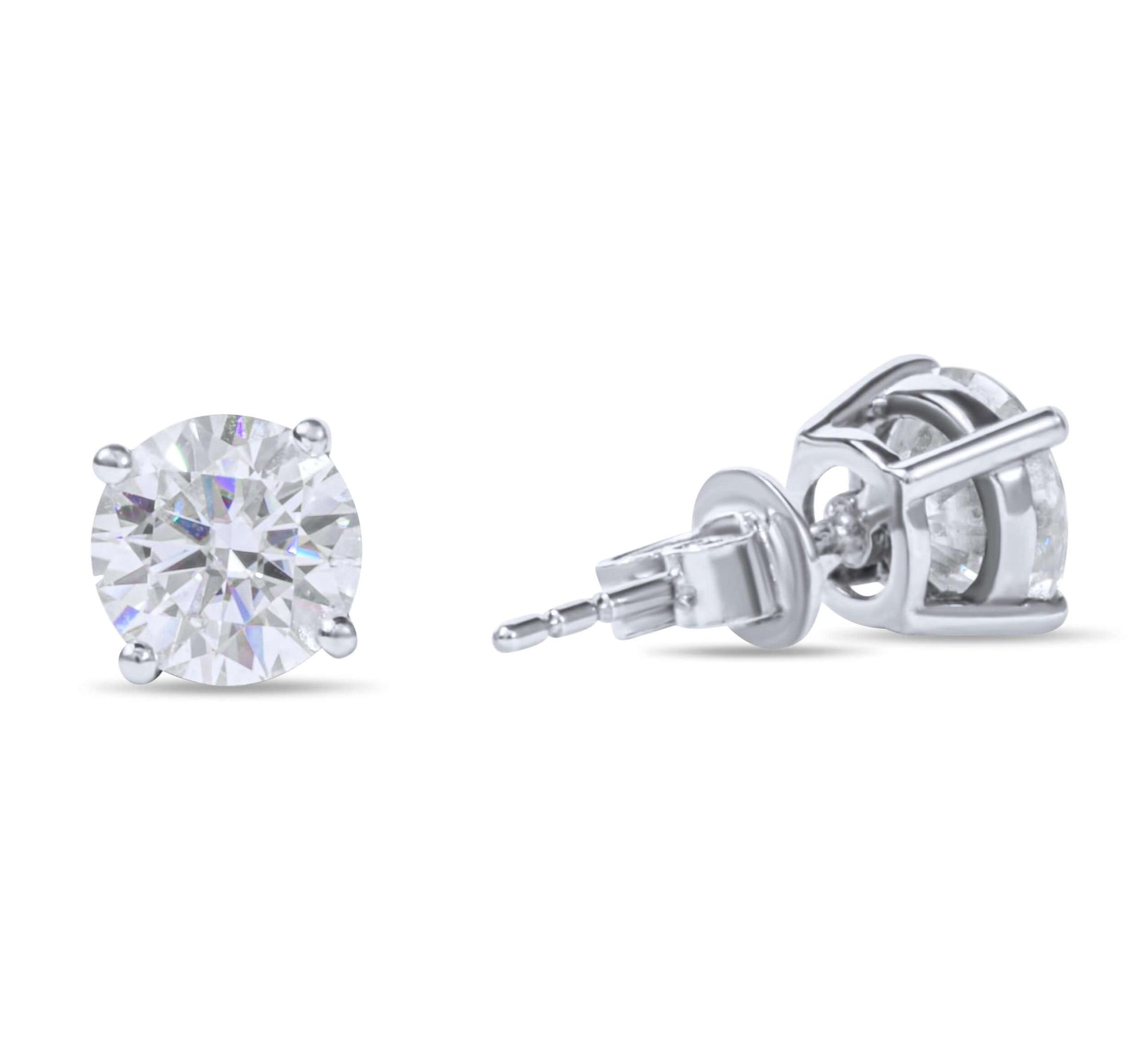 Moissanite Diamond Four Prong Stud White Gold Earrings on white background