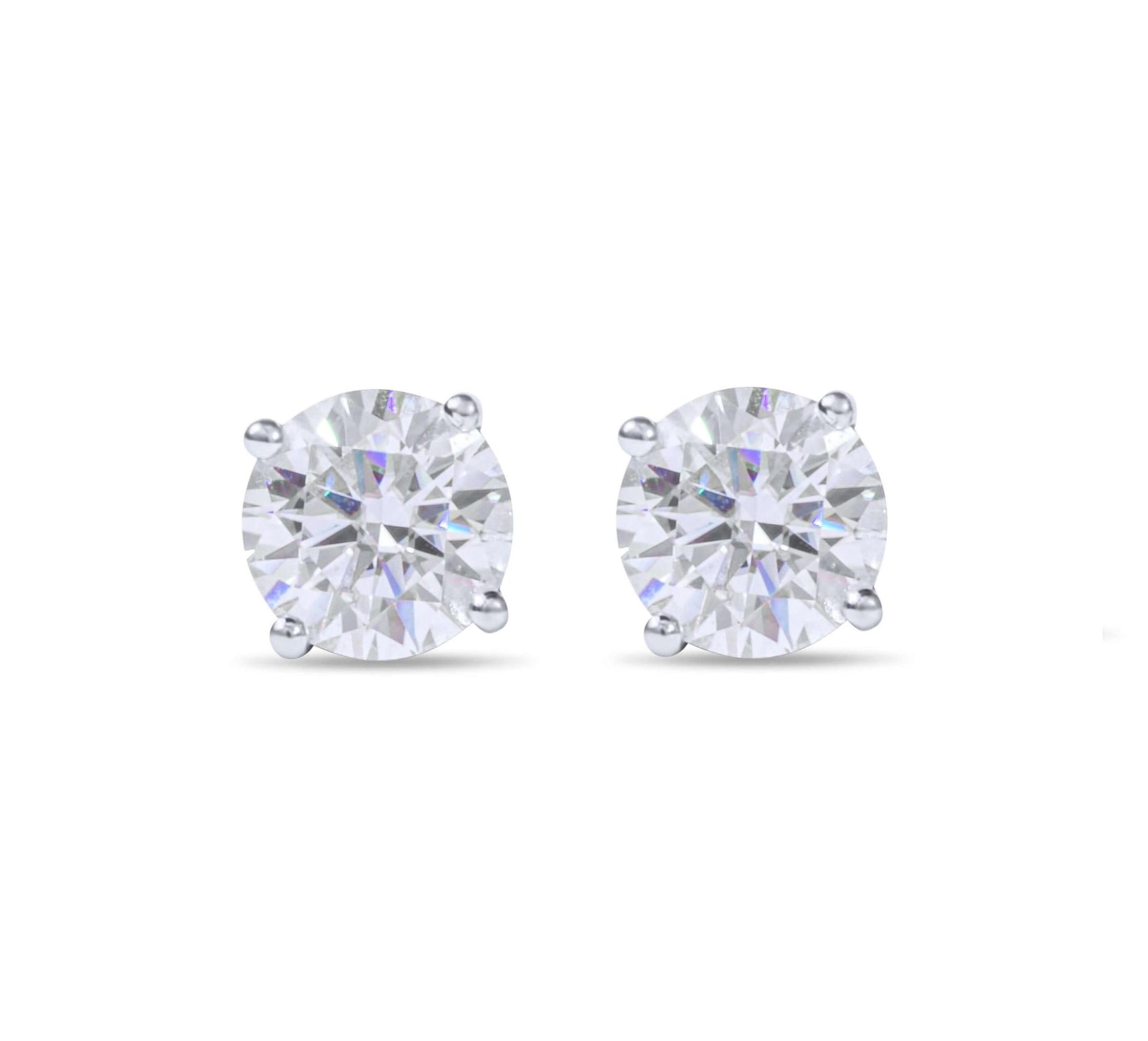 Moissanite Diamond Four Prong Stud Silver Earrings on white background